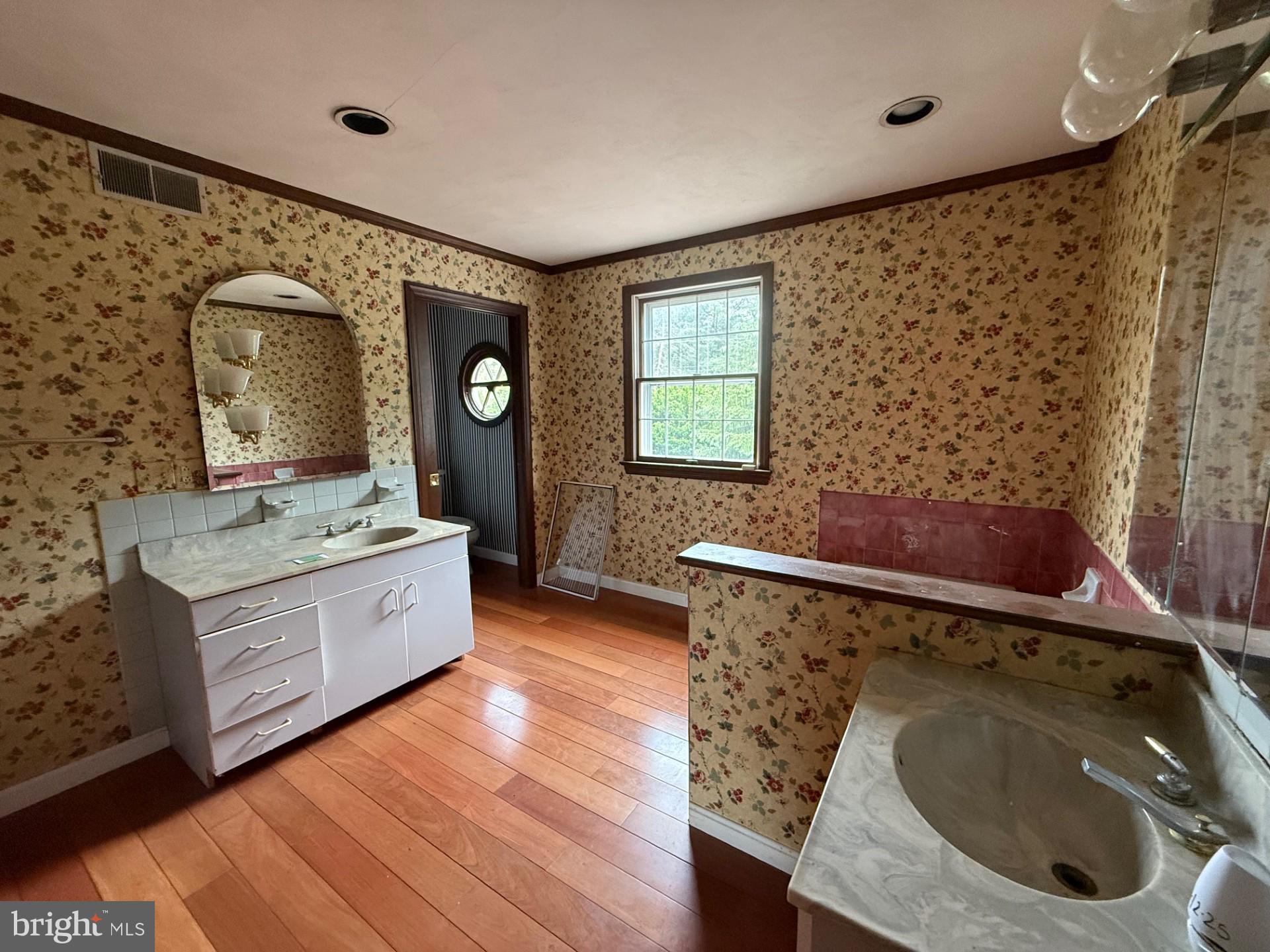 790 Hopewell Road Downingtown, PA 19335 - Photo 21 of 27 a bathroom with a sink and a mirror