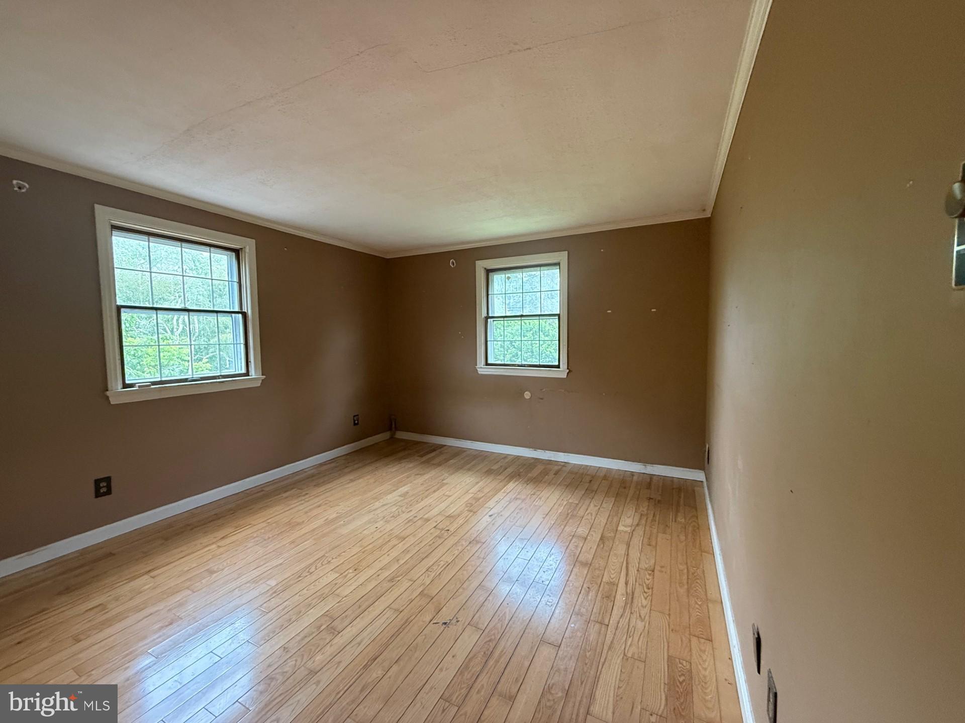 790 Hopewell Road Downingtown, PA 19335 - Photo 24 of 27 a view of an empty room with wooden floor and a window