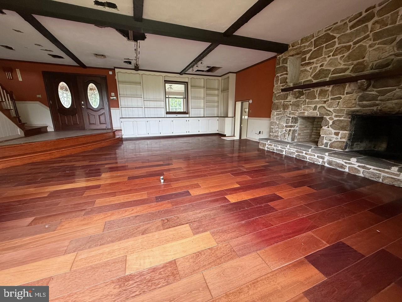790 Hopewell Road Downingtown, PA 19335 - Photo 7 of 27 a view of an empty room with wooden floor and a window