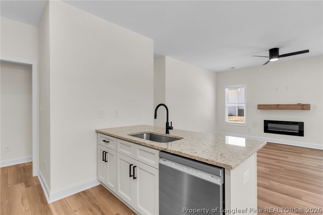 131 Merle Road Pinebluff, NC 28373 - Photo 13 of 33 a view of a kitchen with sink and dishwasher