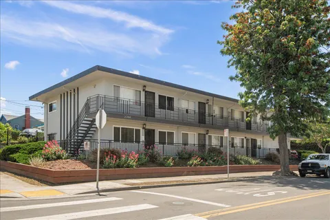 a front view of a building with street view