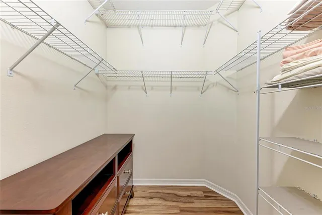 a view of small space with empty racks on the wall