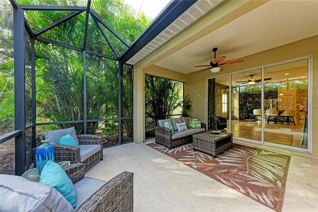 a outdoor space with patio couch and wooden floor