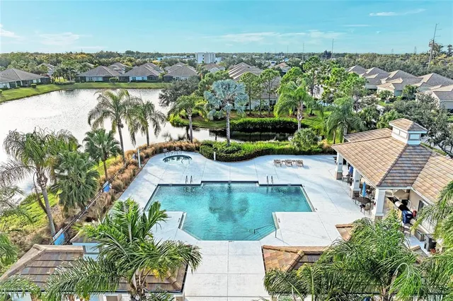 an aerial view of a house with outdoor space
