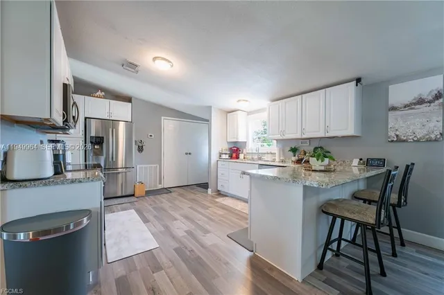 a view of a backyard with a small cabin