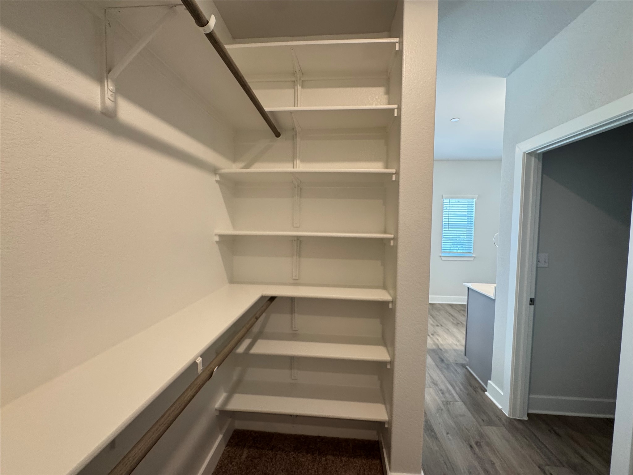 3000 Chisholm Trail Road, Unit 91 Round Rock, TX 78681 - Photo 19 of 27 Ample shelving and hanging space defines this highly functional, organized closet.