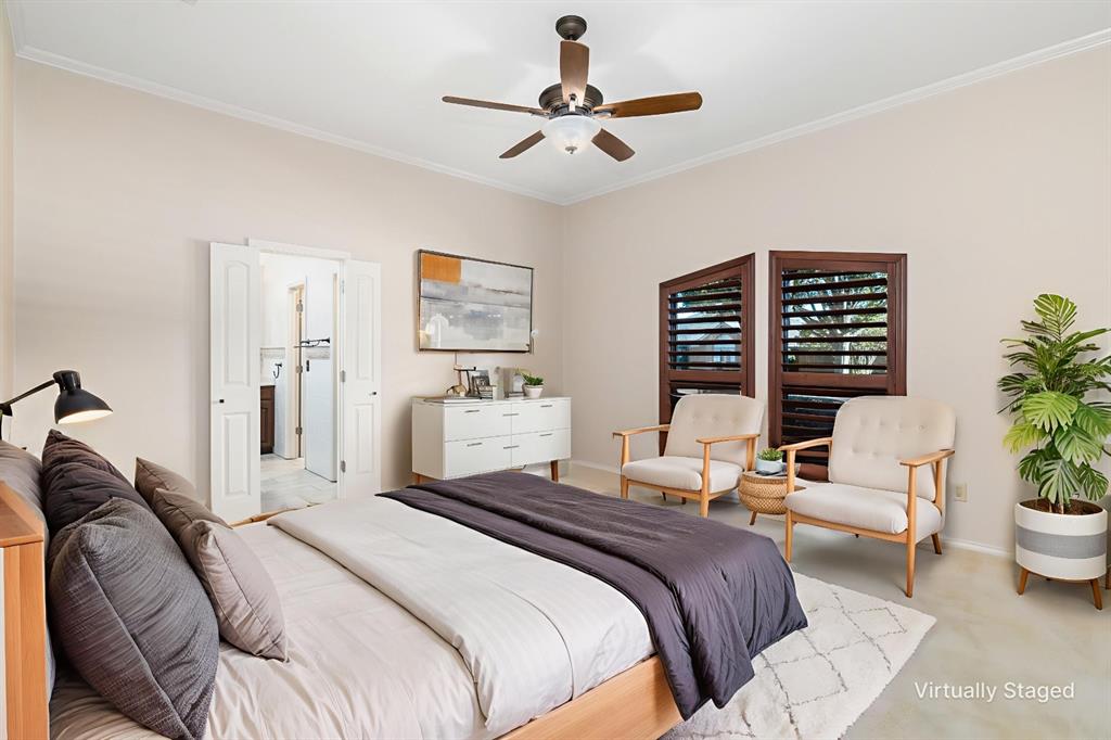 1106 Tahlequah Trail Carrollton, TX 75007 - Photo 11 of 20 a bedroom with a bed a couch and potted plant