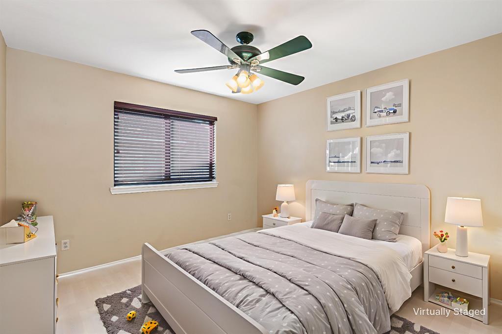 1106 Tahlequah Trail Carrollton, TX 75007 - Photo 16 of 20 a bedroom with a bed and a window