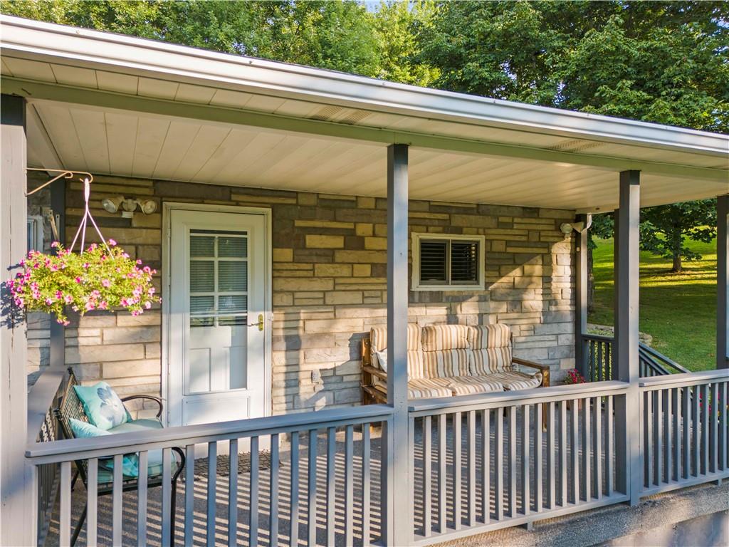 1460 Nine Eighty Road Canonsburg, PA 15317 - Photo 3 of 33 Right side of home. Nice covered side porch for evening relaxation.
