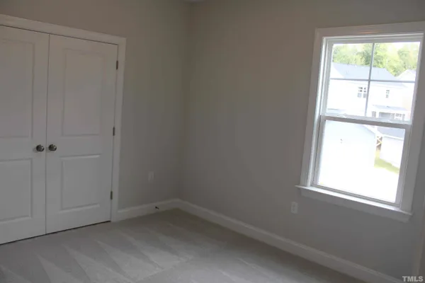 a bathroom with a granite countertop toilet a sink and a bathtub