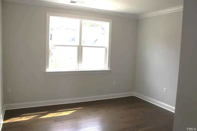 a bathroom with a shower a toilet and sink