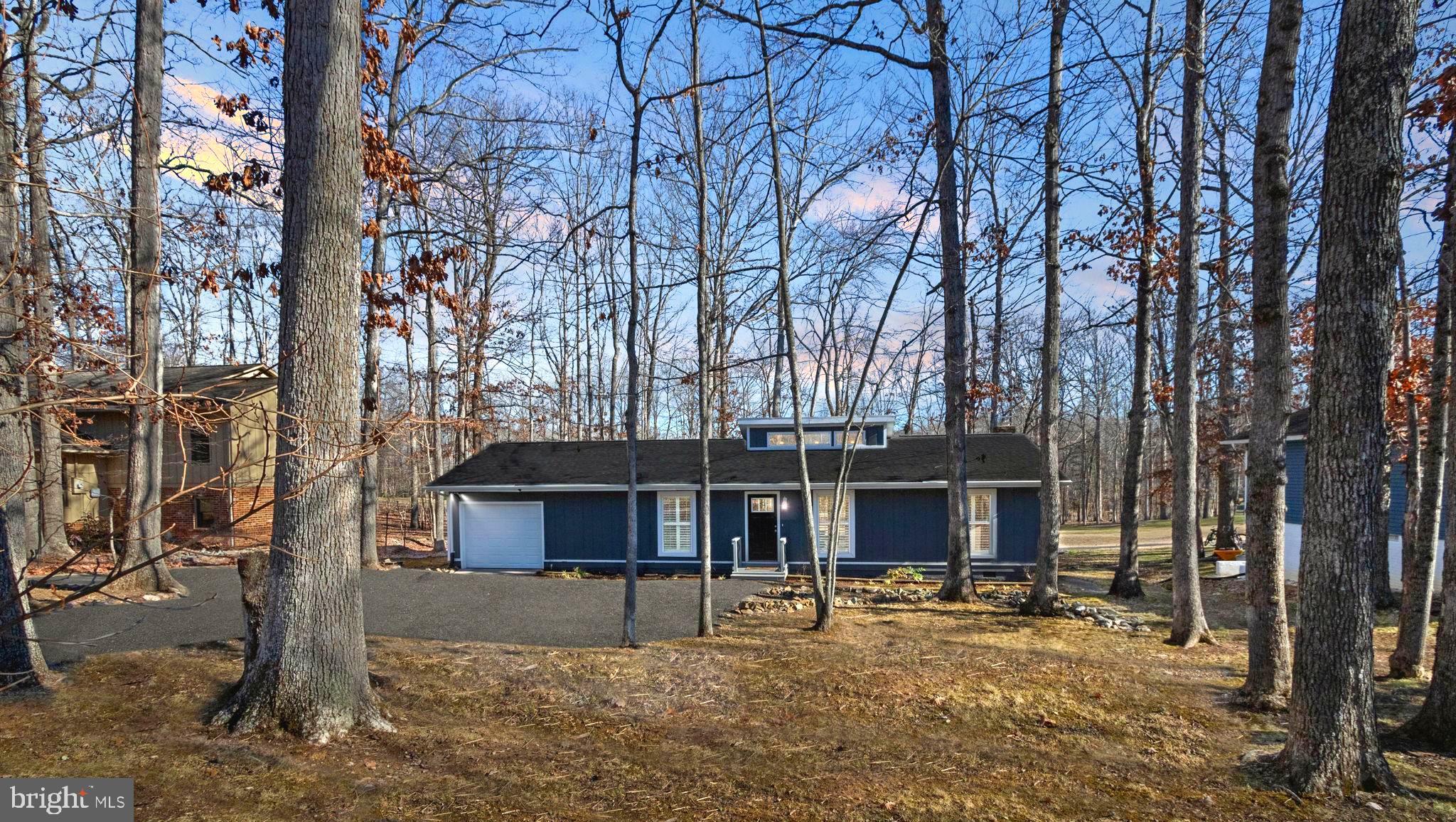 307 Limestone Lane Locust Grove, VA 22508 - Photo 1 of 31 Wooded Rambler Retreat