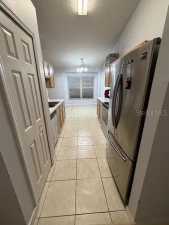a view of entryway with a washer and dryer
