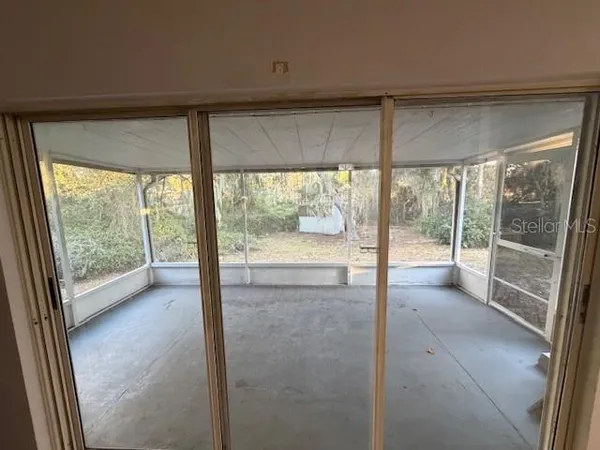 a view of a room with a large window