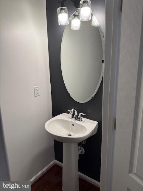 1008 Sithean Way Glen Burnie, MD 21060 - Photo 16 of 32 Sleek half-bath with modern accents.