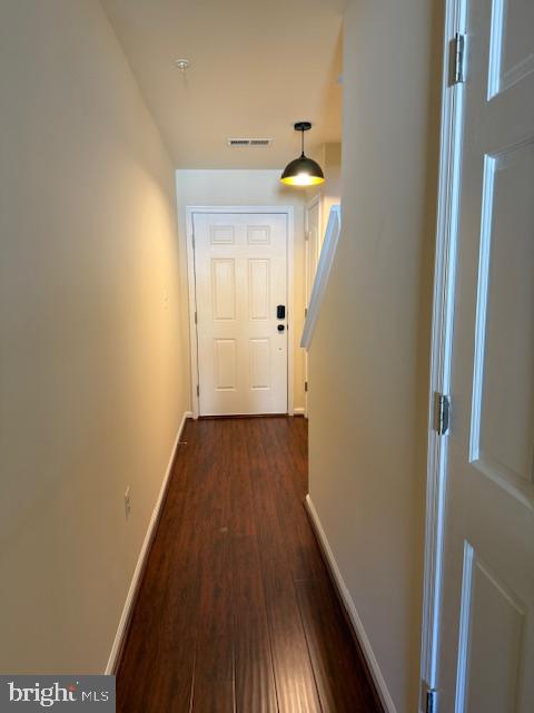 1008 Sithean Way Glen Burnie, MD 21060 - Photo 18 of 32 Inviting hallway with warm lighting.