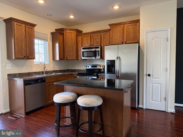 1008 Sithean Way Glen Burnie, MD 21060 - Photo 2 of 32 Modern kitchen with warm wood accents.