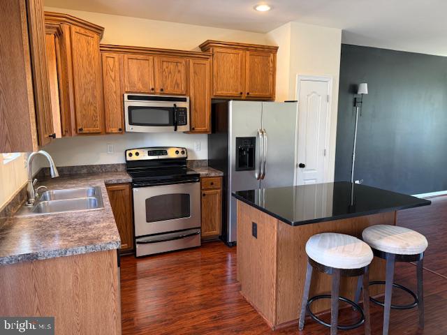 1008 Sithean Way Glen Burnie, MD 21060 - Photo 3 of 32 Modern kitchen with warm wood accents.