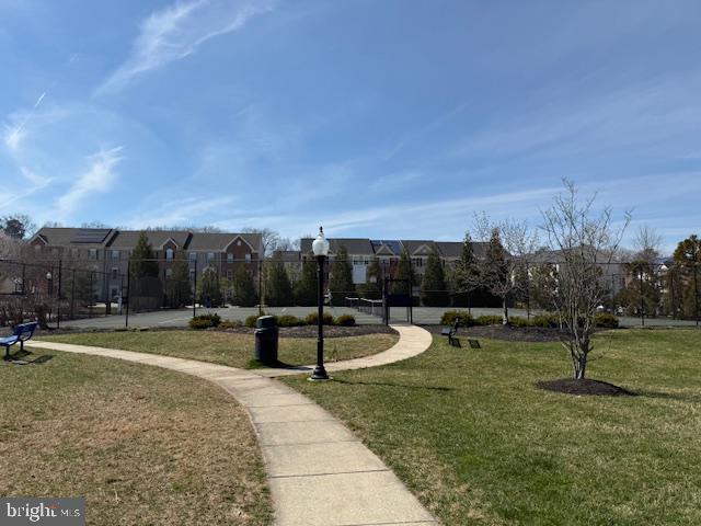 1008 Sithean Way Glen Burnie, MD 21060 - Photo 31 of 32 Tranquil park path under blue skies.