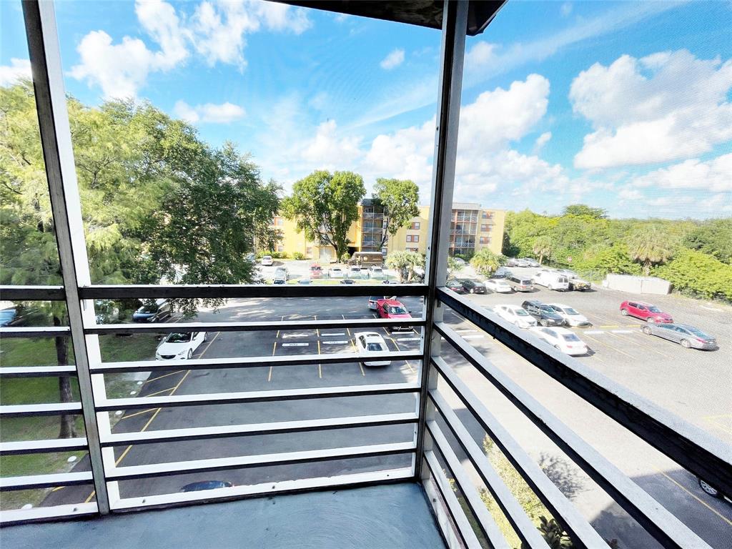 2800 Northwest 56th Avenue, Unit D402 Lauderhill, FL 33313 - Photo 10 of 14 a view of a city from a balcony