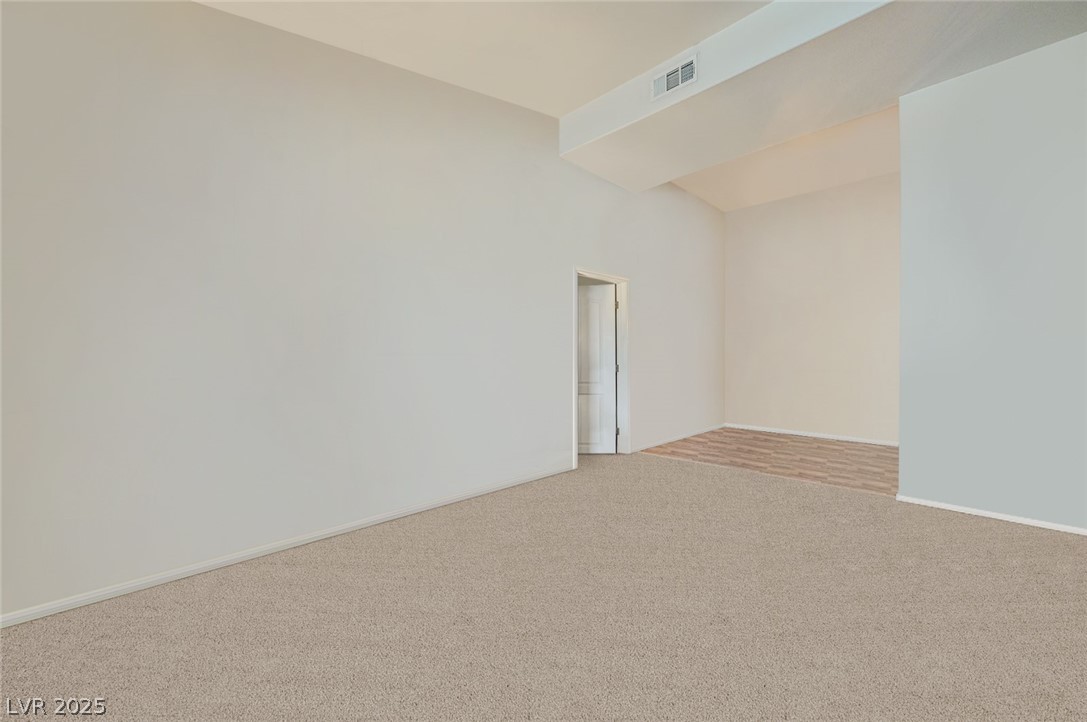 2305 West Horizon Ridge Parkway, Unit 1223 Henderson, NV 89052 - Photo 7 of 28 Carpeted spare room featuring baseboards
