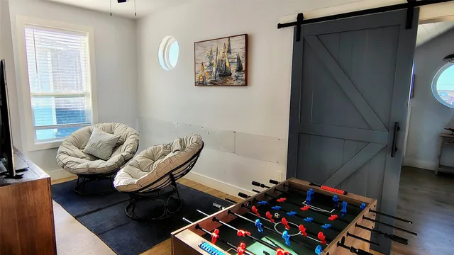 a room with furniture and a window