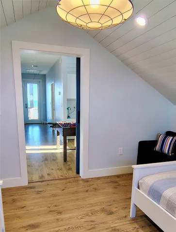 a view of a bedroom from the hallway