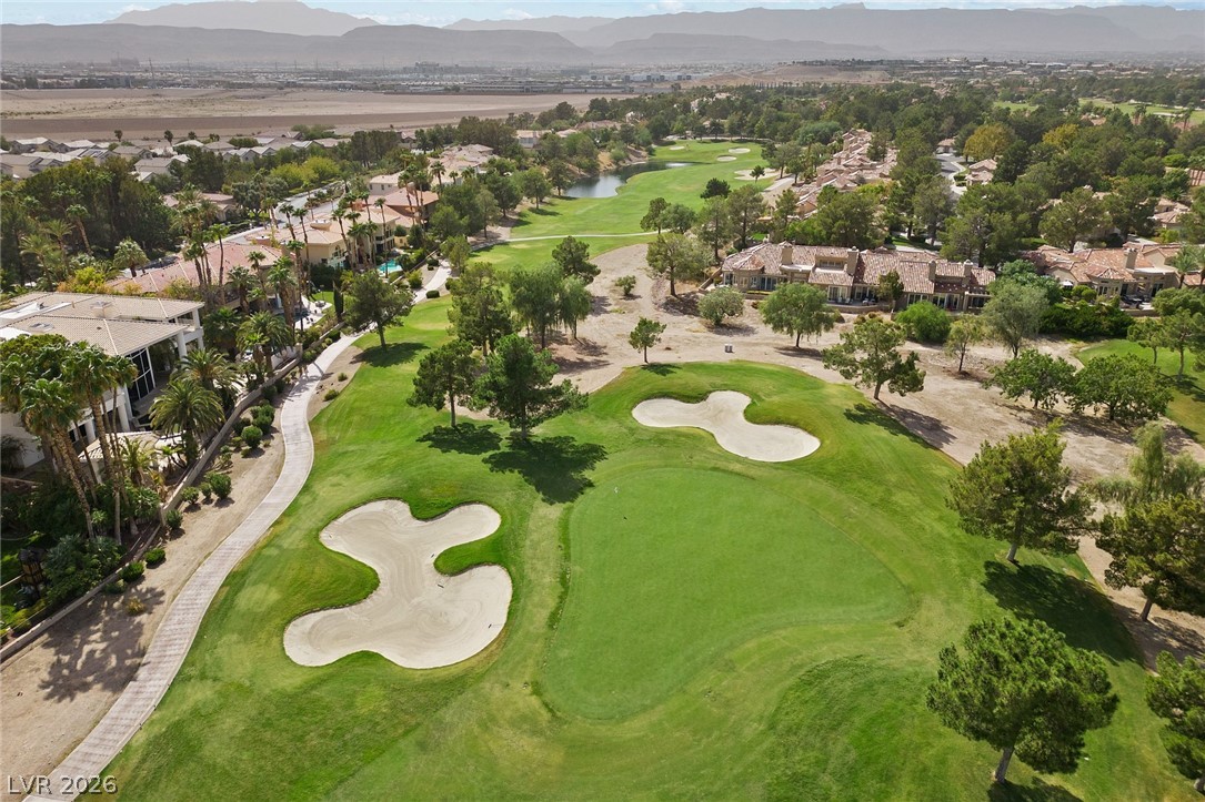 20 Innisbrook Avenue Las Vegas, NV 89113 - Photo 18 of 39 Green fairways and sand traps create an idyllic golf course community setting.