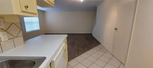 a view of a kitchen from the kitchen