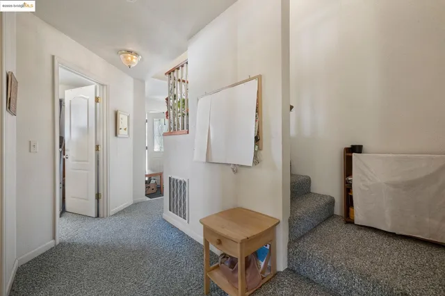 a room with furniture and a gate