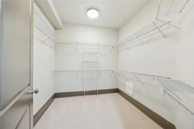 a view of a room with racks on the wall