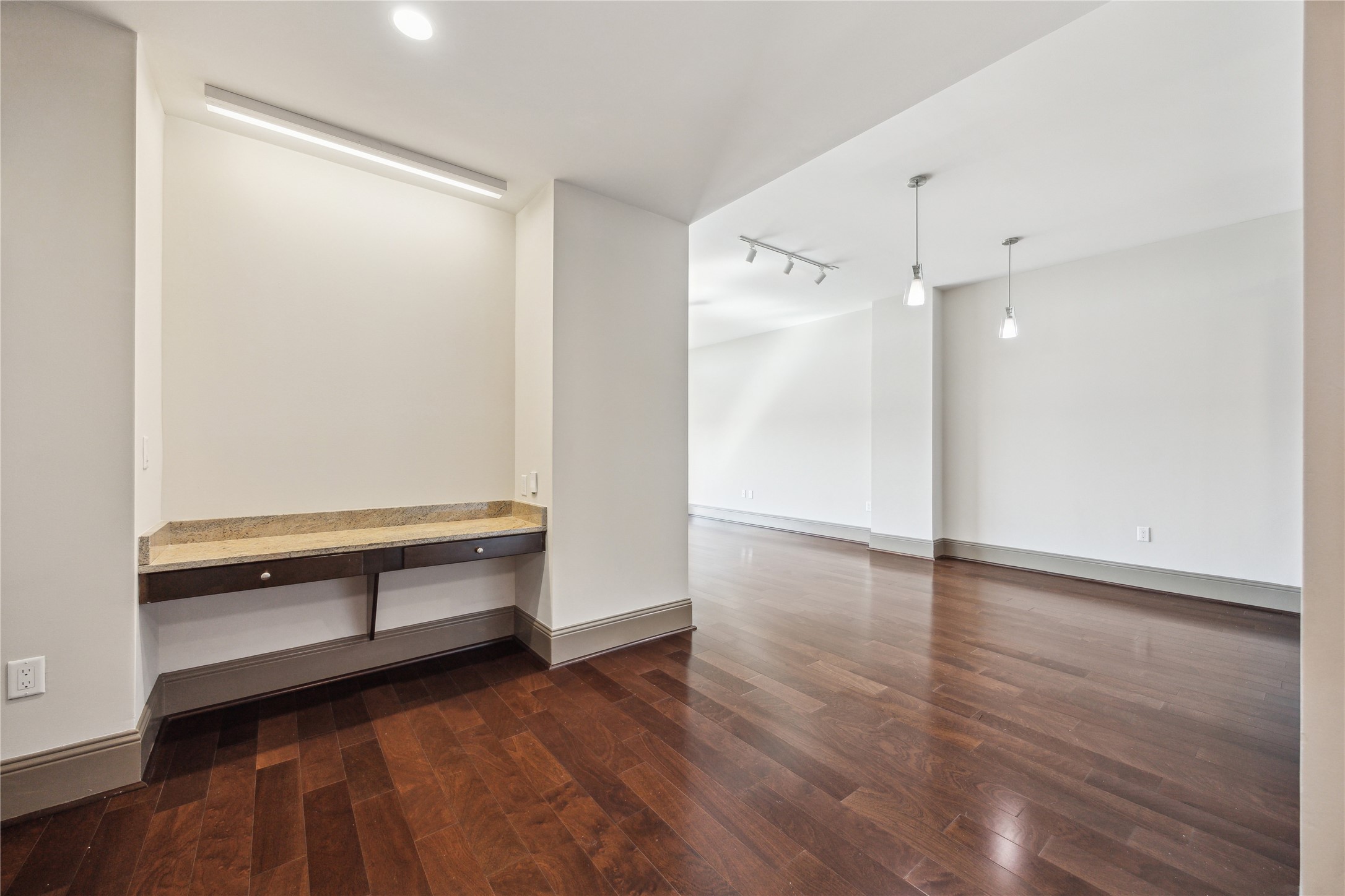 9870 Gaylord Drive, Unit 518 Houston, TX 77024 - Photo 4 of 34 a view of room with wooden floor