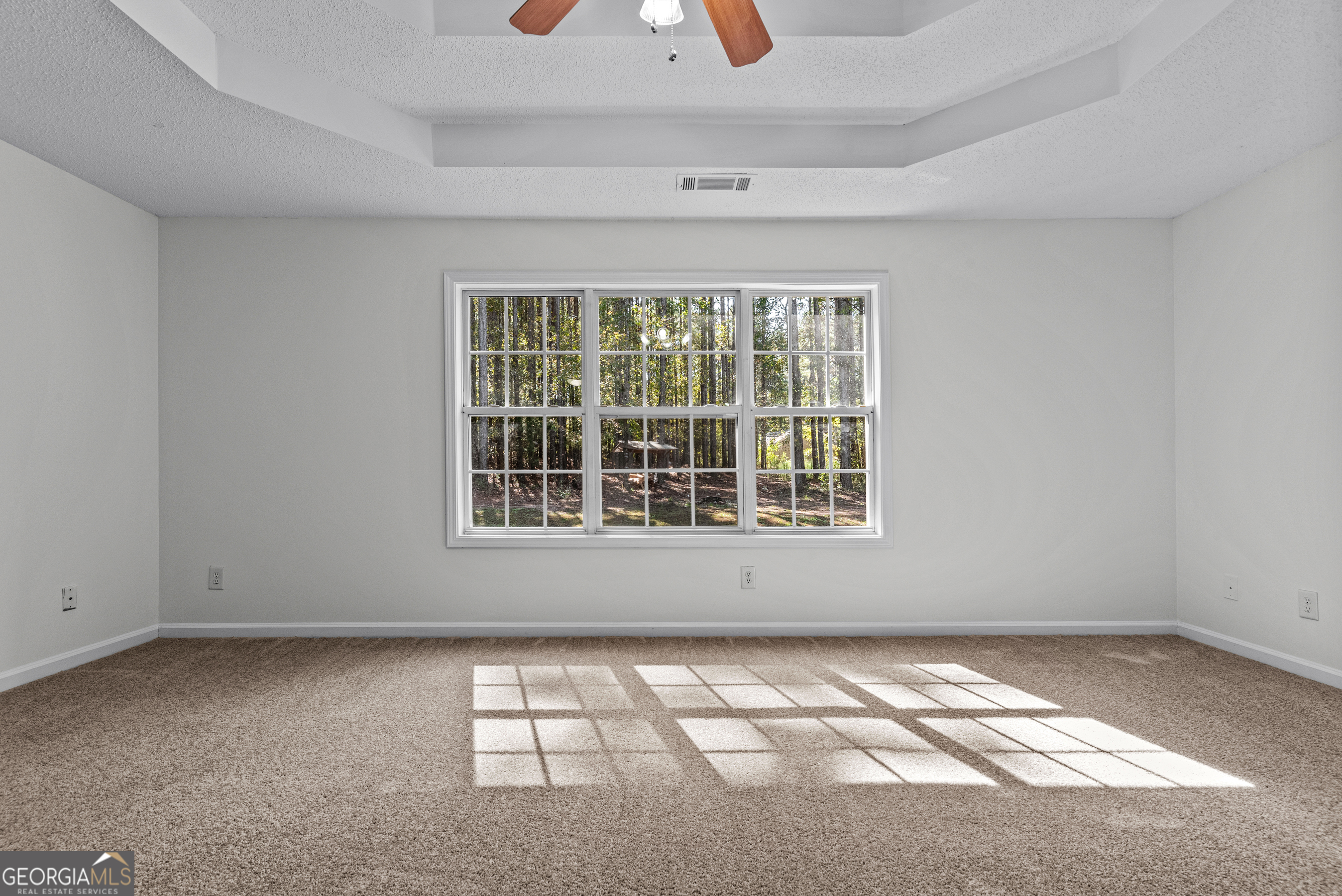 427 Bridges Way Winterville, GA 30683 - Photo 30 of 43 a view of an empty room with a window
