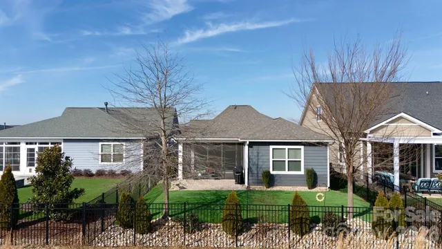 front view of a house with a garden