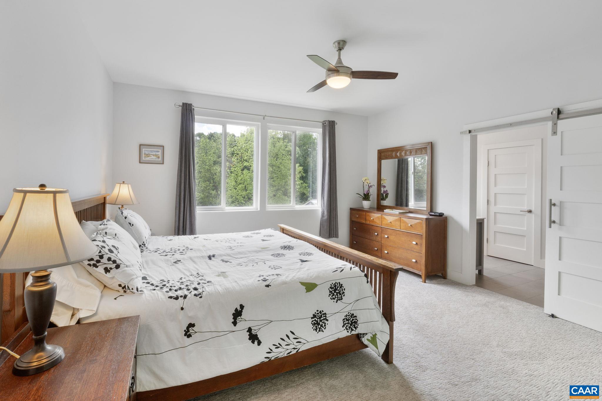 3457 Morgantown Road Charlottesville, VA 22903 - Photo 36 of 64 a bedroom with a bed dresser and a large window