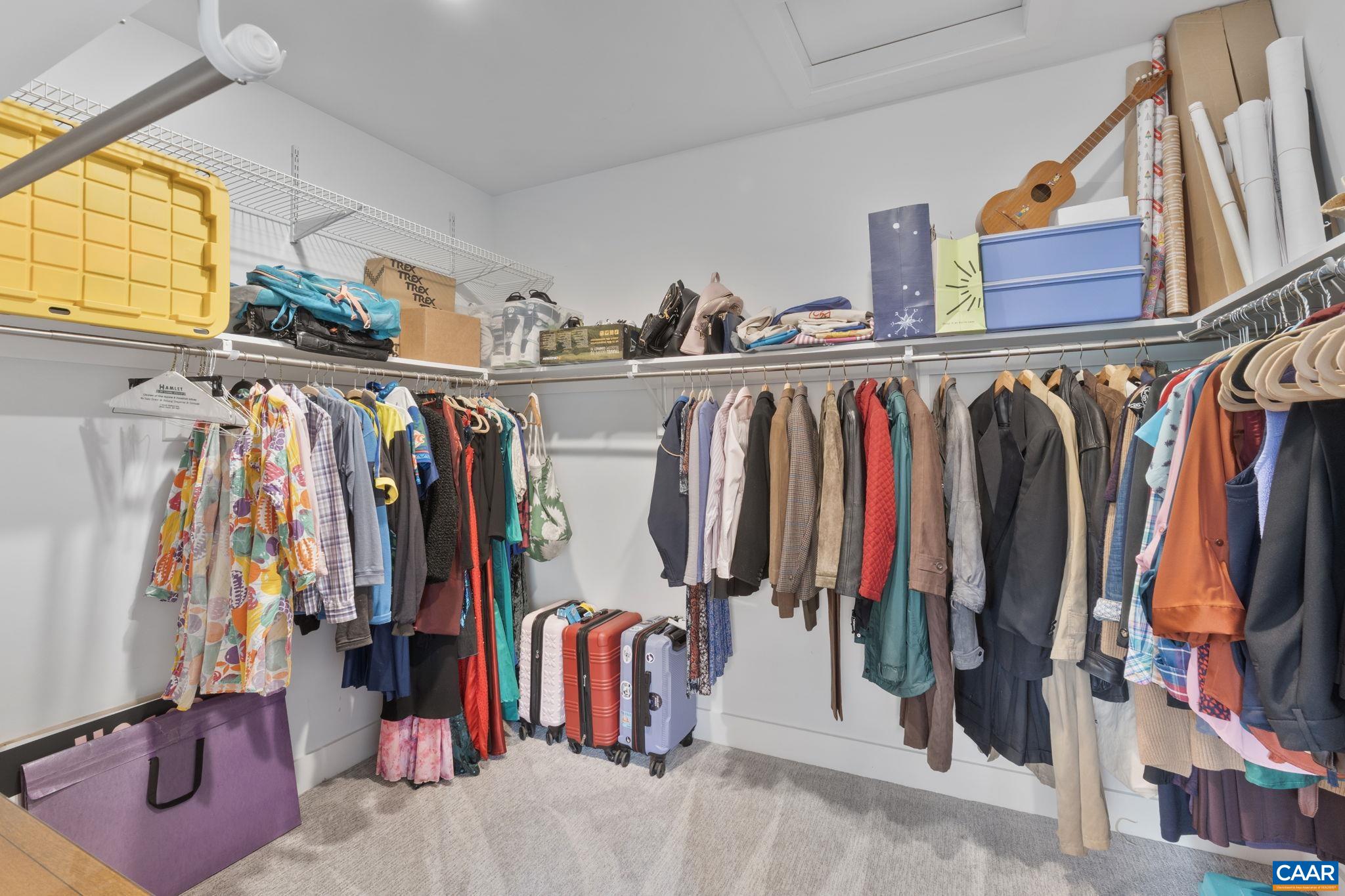 3457 Morgantown Road Charlottesville, VA 22903 - Photo 42 of 64 a view of walk in closet with clothes and shoes