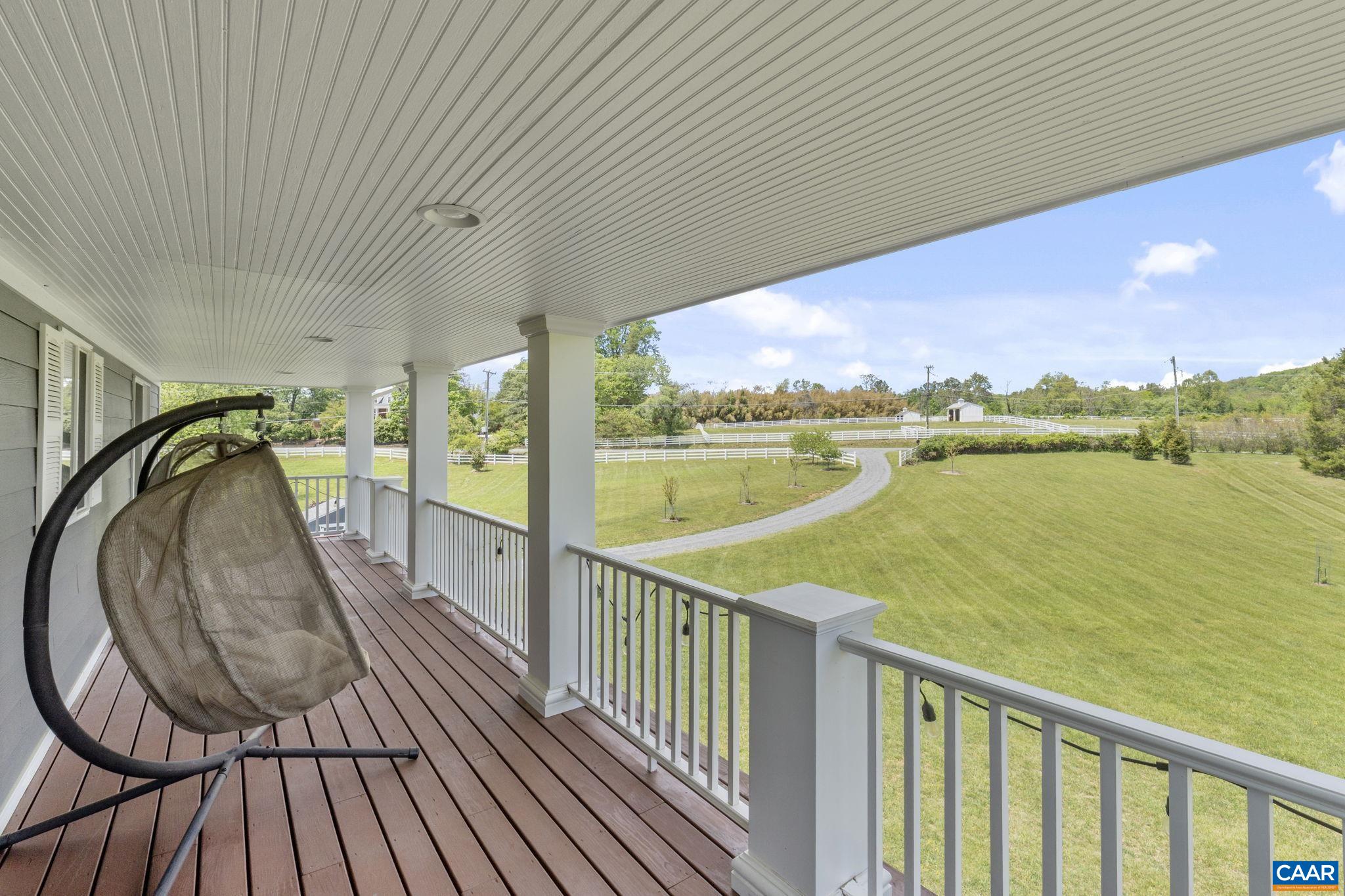 3457 Morgantown Road Charlottesville, VA 22903 - Photo 60 of 64 a view of a balcony with wooden floor & fence