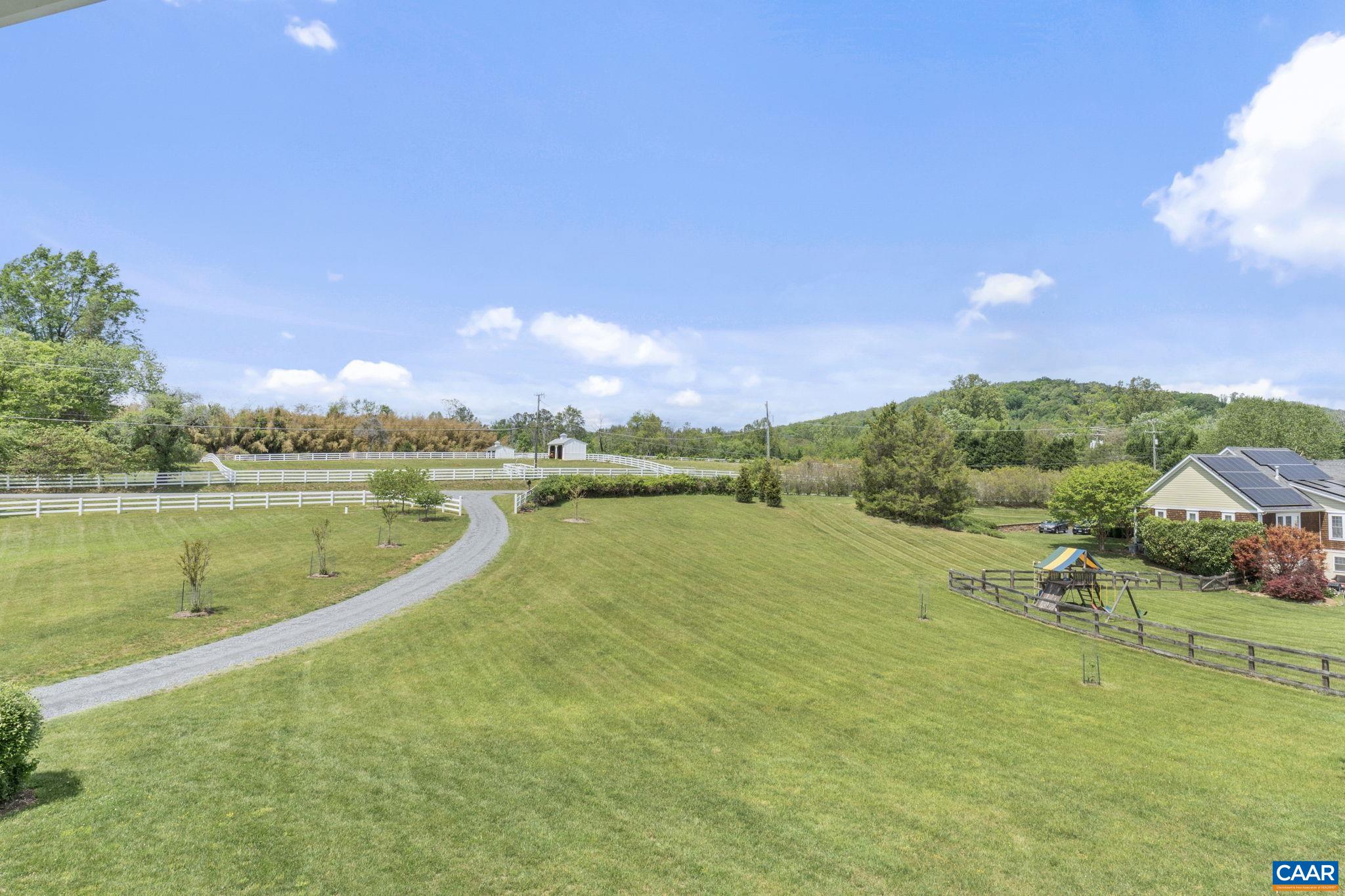 3457 Morgantown Road Charlottesville, VA 22903 - Photo 63 of 64 a view of a lake with a houses