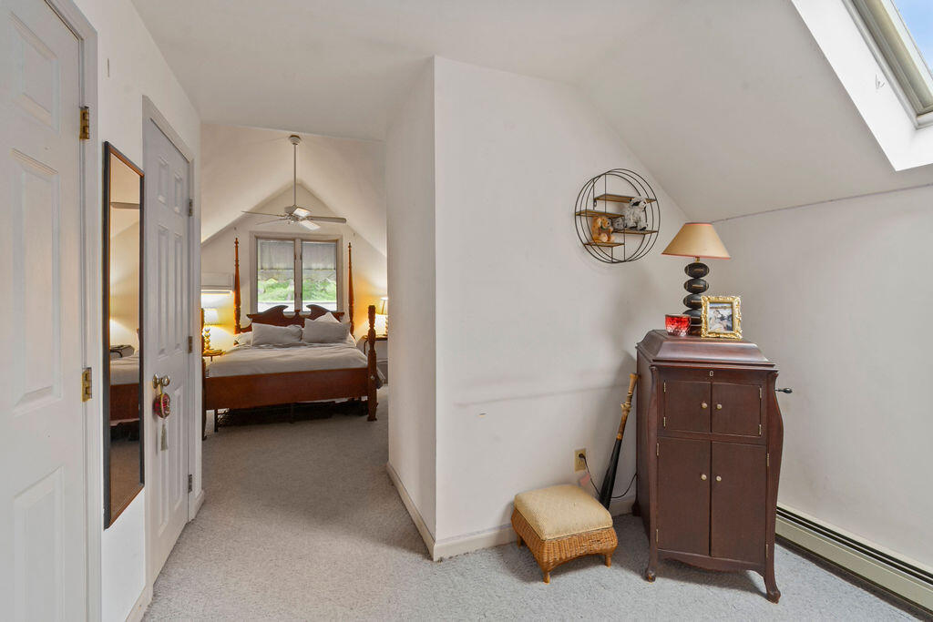 24 Indigo Lane Osterville, MA 02655 - Photo 26 of 84 a bedroom with bed and window