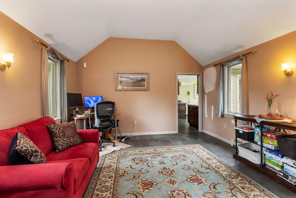 24 Indigo Lane Osterville, MA 02655 - Photo 42 of 84 a living room with furniture and a rug