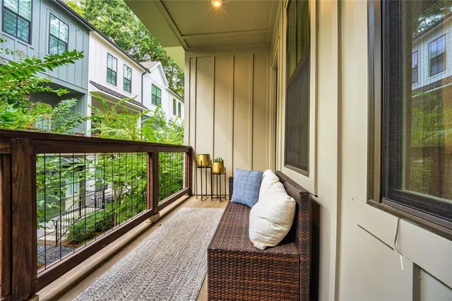 a balcony view with a garden