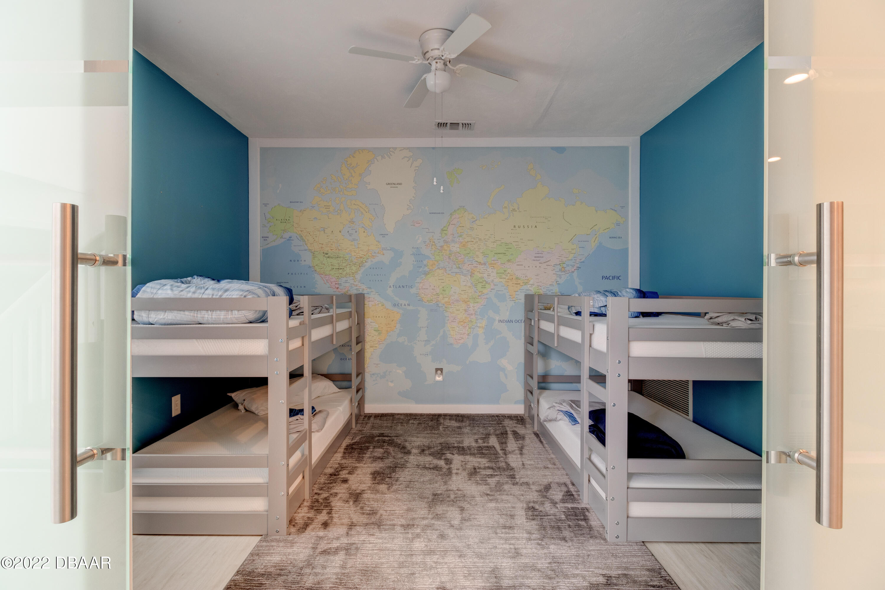 13 Bay Pointe Drive Ormond Beach, FL 32174 - Photo 13 of 44 a room with cabinets and a fireplace