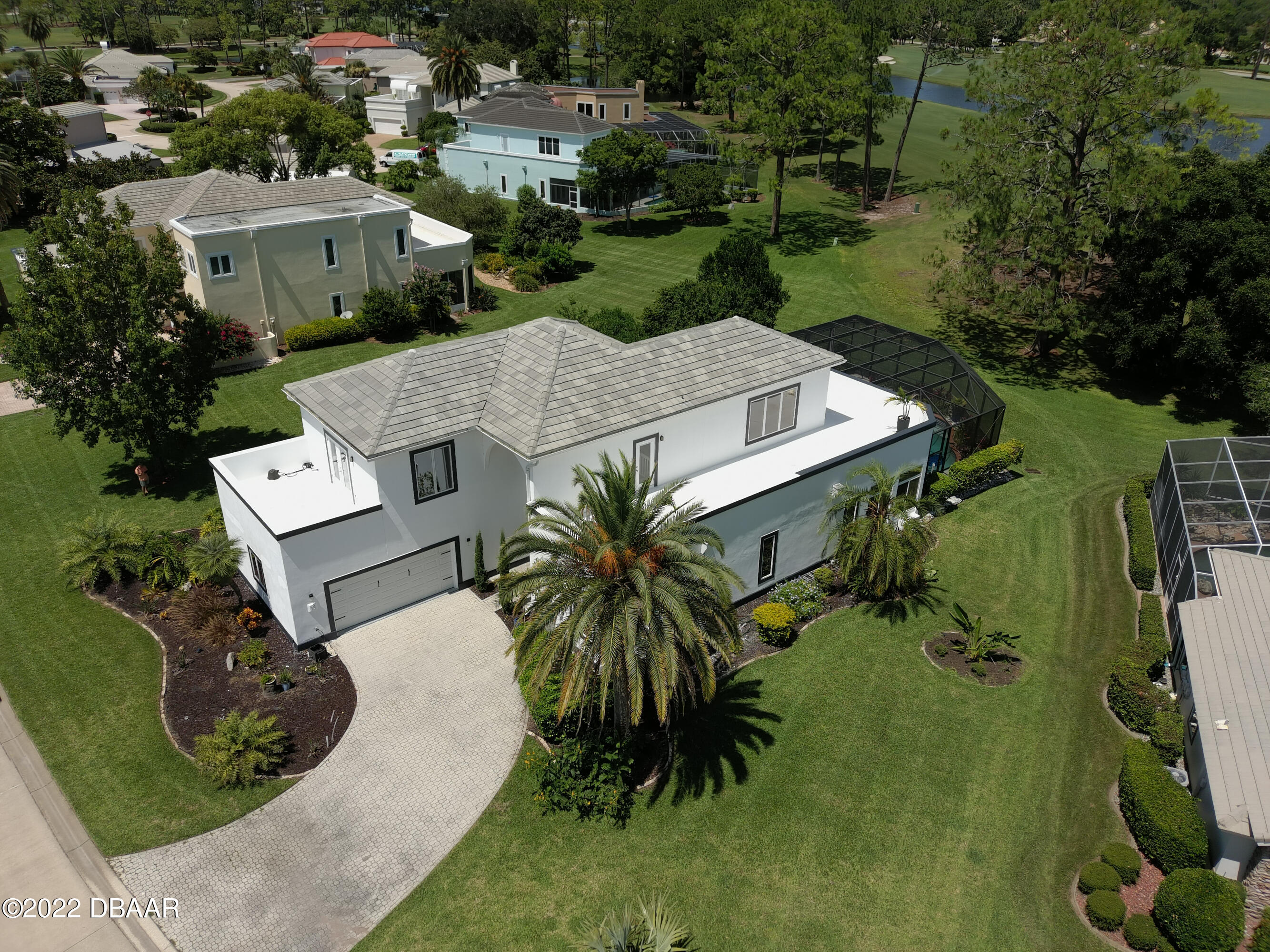 13 Bay Pointe Drive Ormond Beach, FL 32174 - Photo 2 of 44 an aerial view of a house with outdoor space and street view