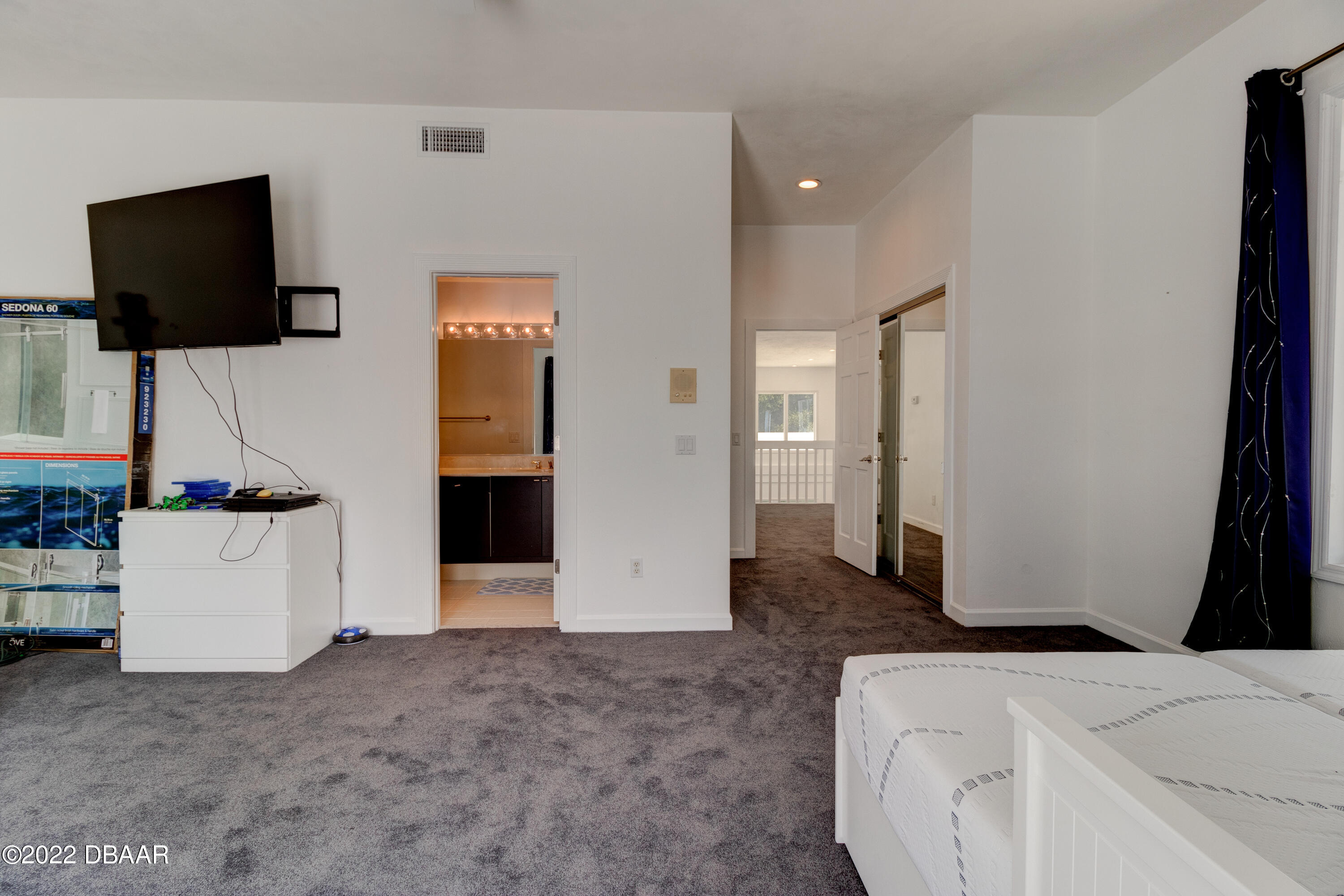 13 Bay Pointe Drive Ormond Beach, FL 32174 - Photo 25 of 44 a view of a livingroom with furniture and flat screen tv