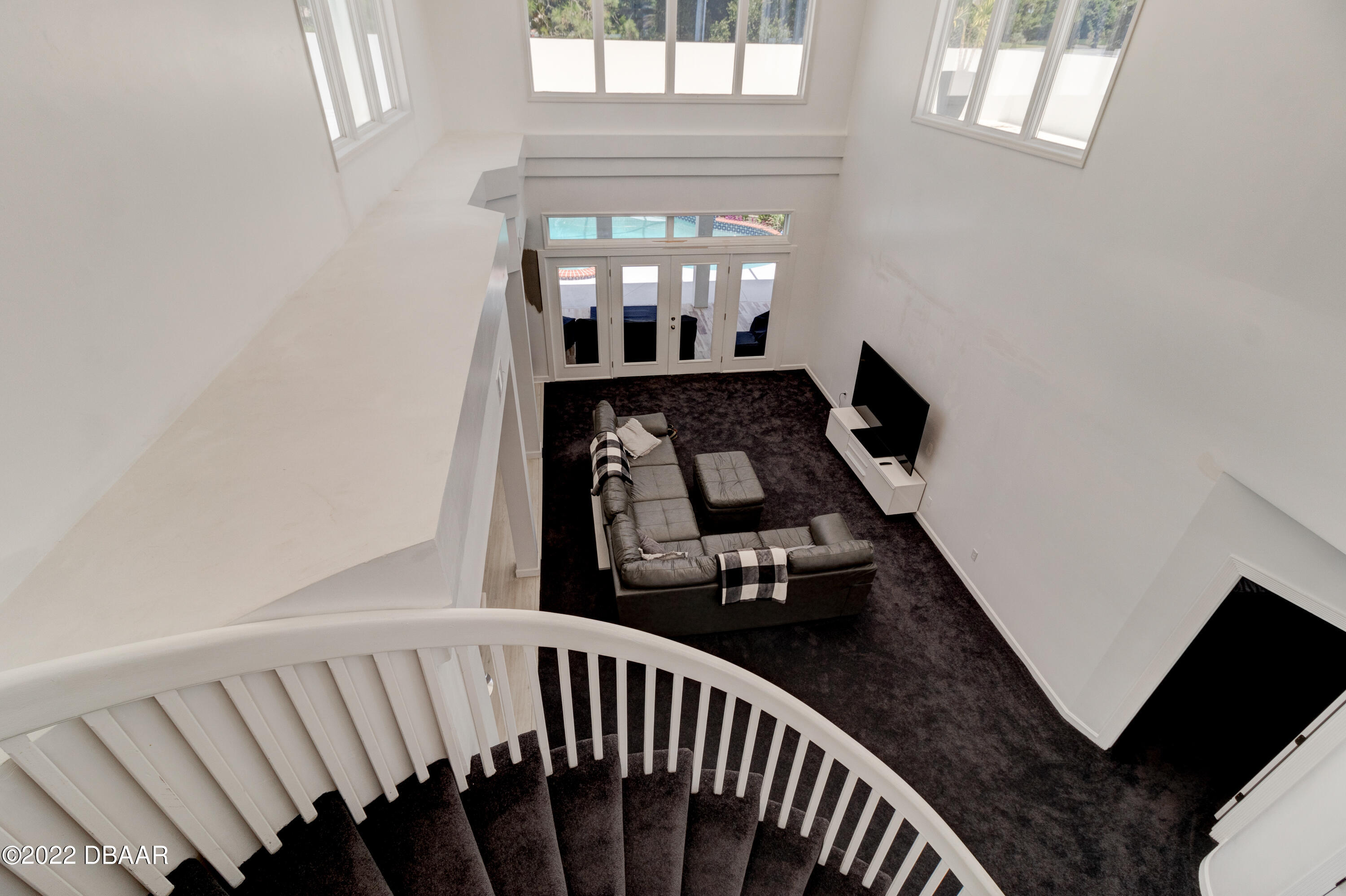 13 Bay Pointe Drive Ormond Beach, FL 32174 - Photo 28 of 44 a view of a balcony with furniture