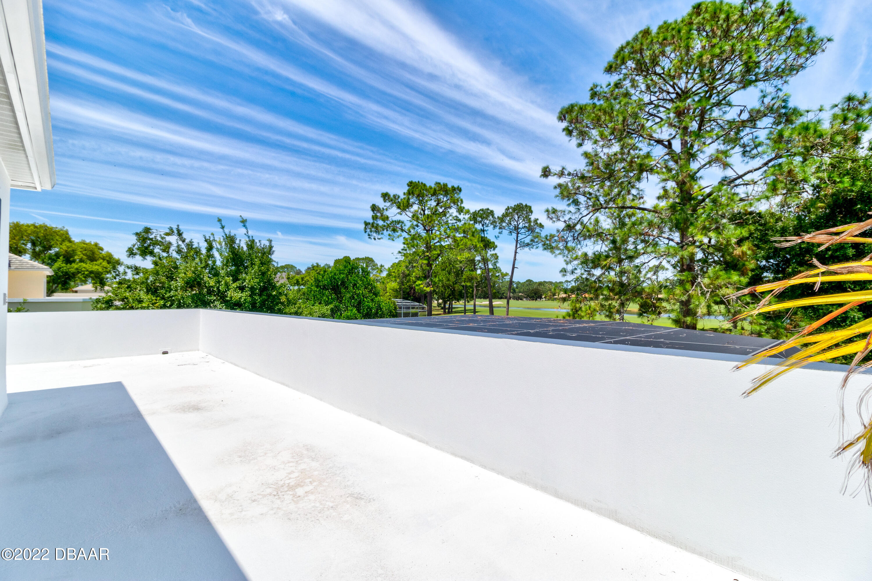 13 Bay Pointe Drive Ormond Beach, FL 32174 - Photo 31 of 44 a view of a garden
