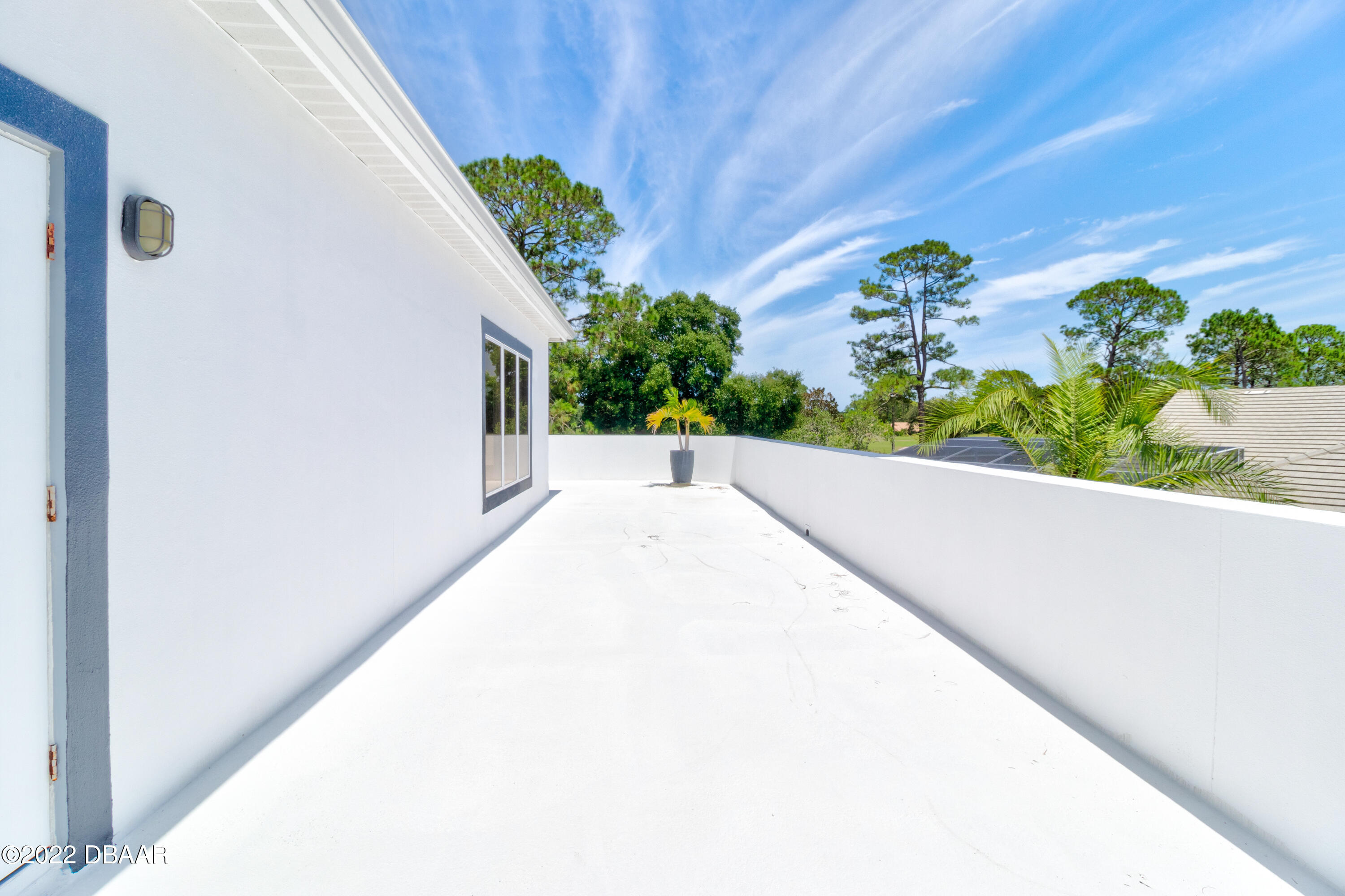 13 Bay Pointe Drive Ormond Beach, FL 32174 - Photo 32 of 44 a view of a garden