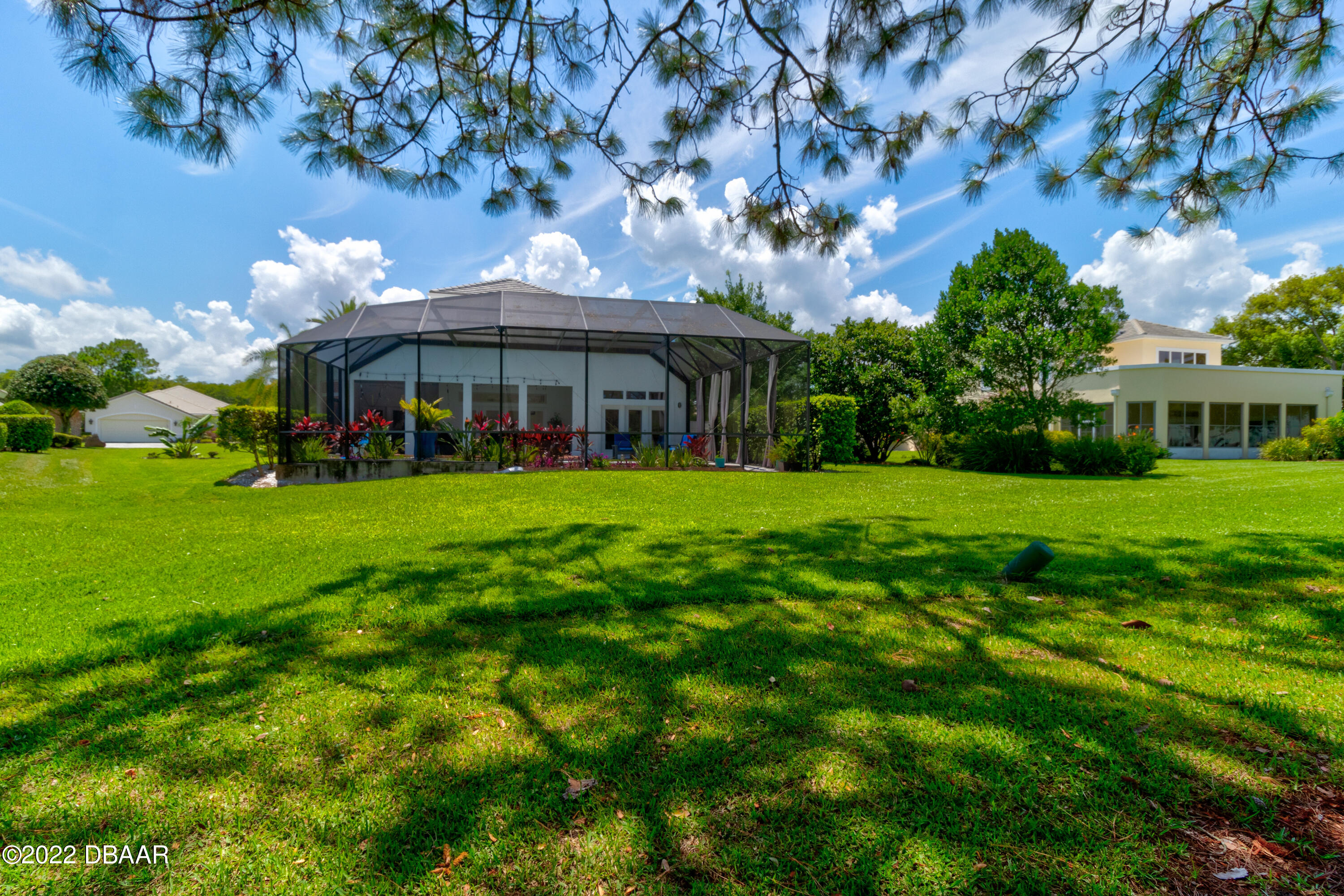 13 Bay Pointe Drive Ormond Beach, FL 32174 - Photo 37 of 44 a view of a house with a yard