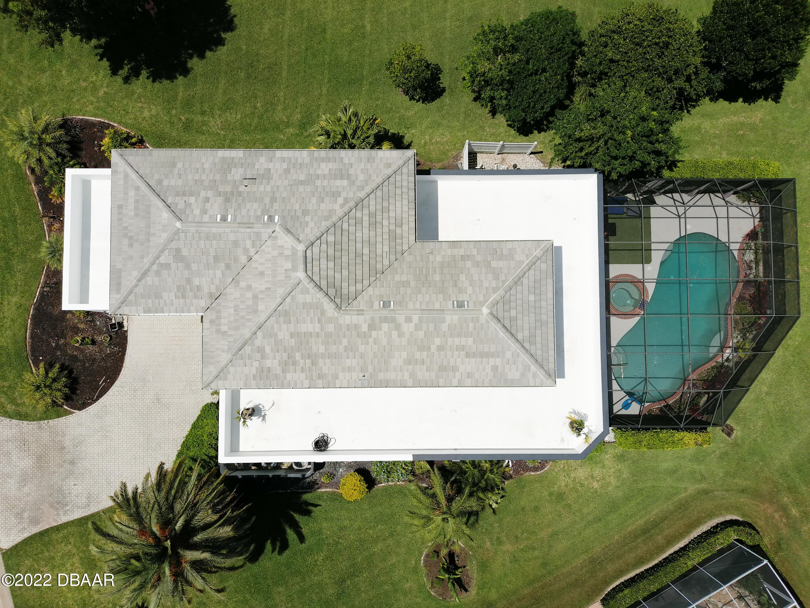 13 Bay Pointe Drive Ormond Beach, FL 32174 - Photo 39 of 44 an aerial view of a house with a yard