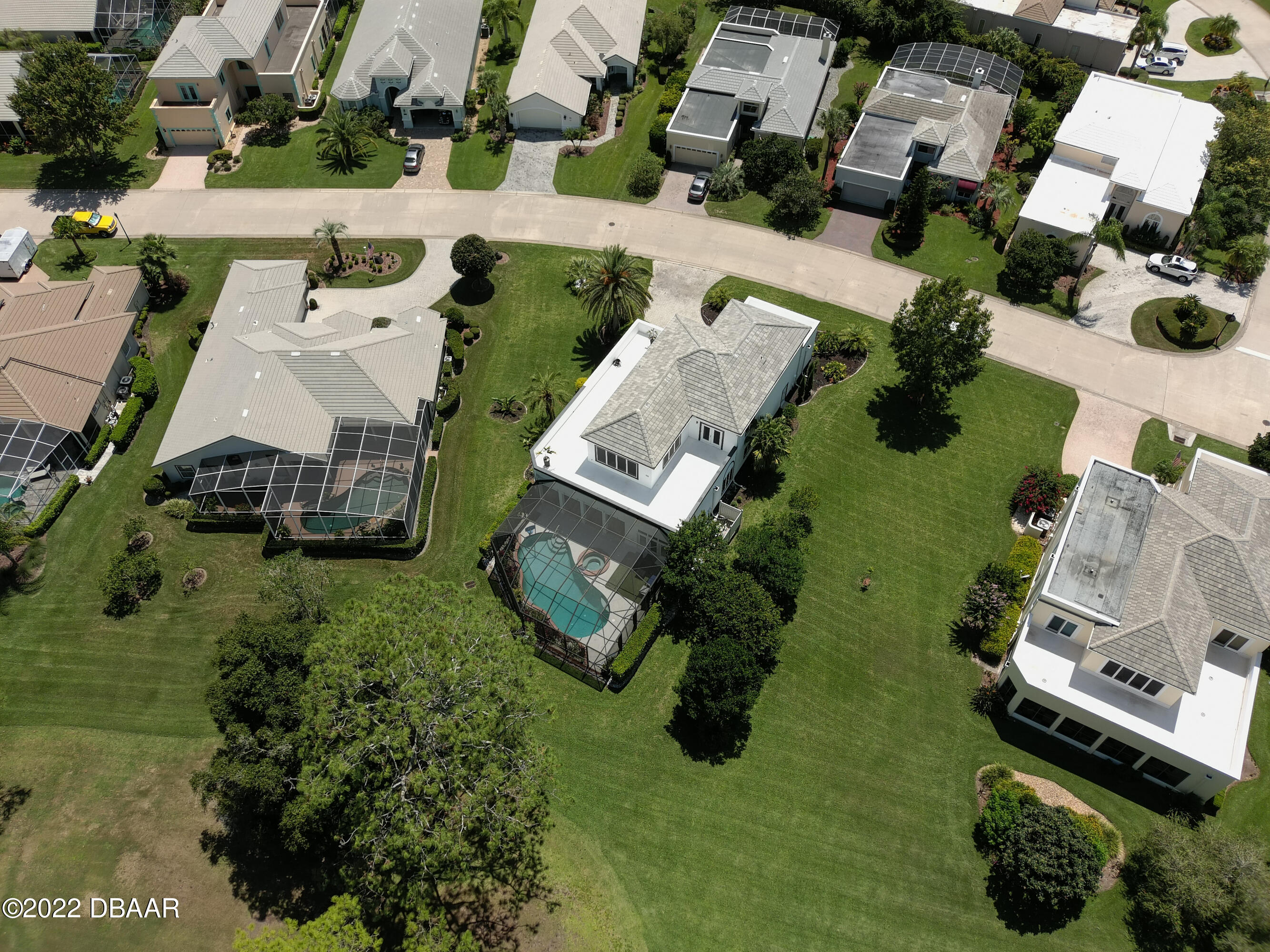 13 Bay Pointe Drive Ormond Beach, FL 32174 - Photo 42 of 44 an aerial view of a house with a yard basket ball court and outdoor seating